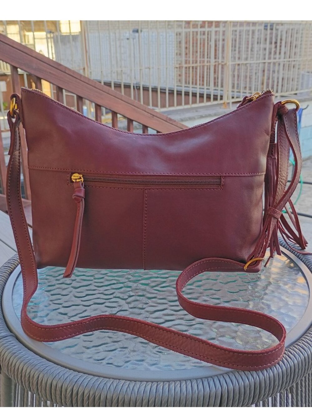 Margot S Crossbody Leather Bag Wine Adjustable Strap Gold Accents Tassel Detail